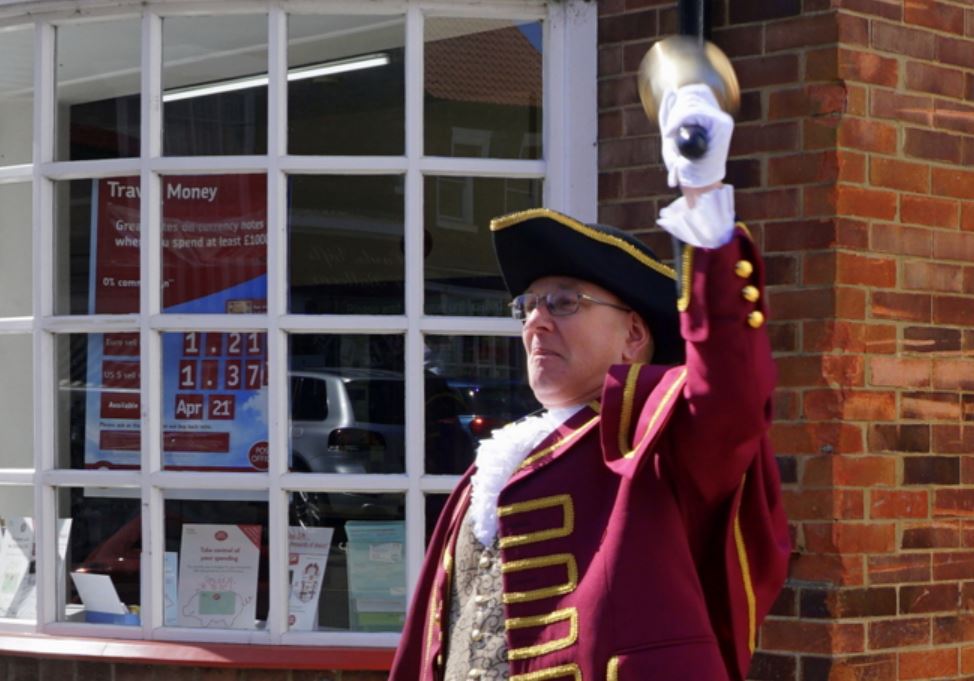 town crier rings news 2