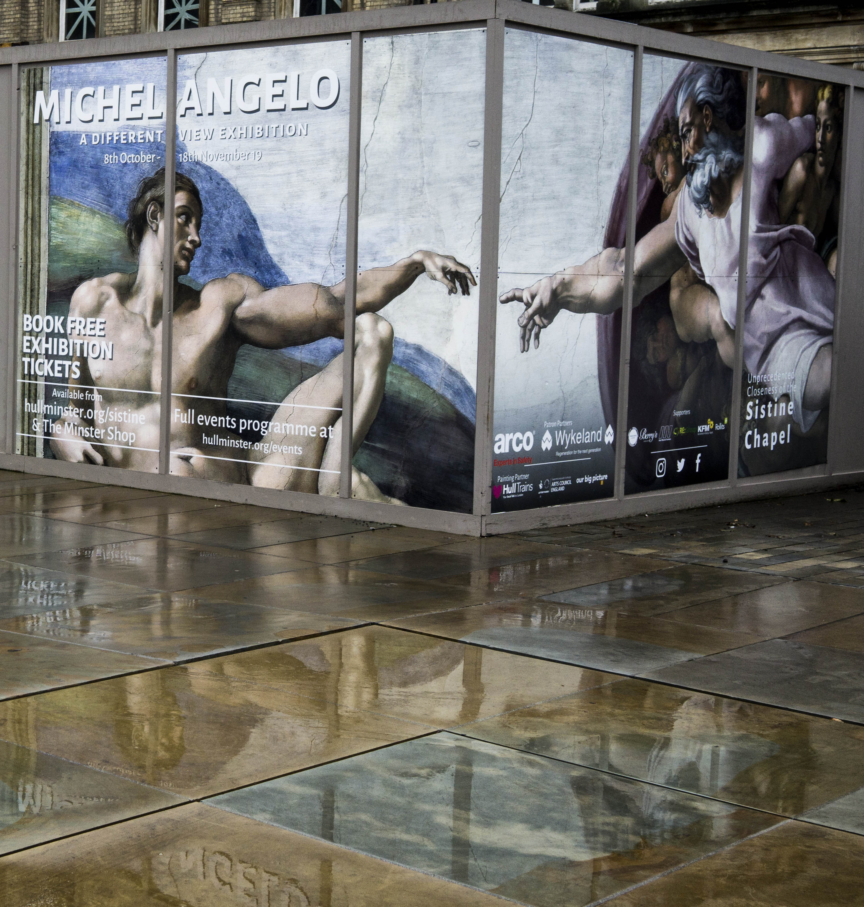 Michel Angelo puddle reflection