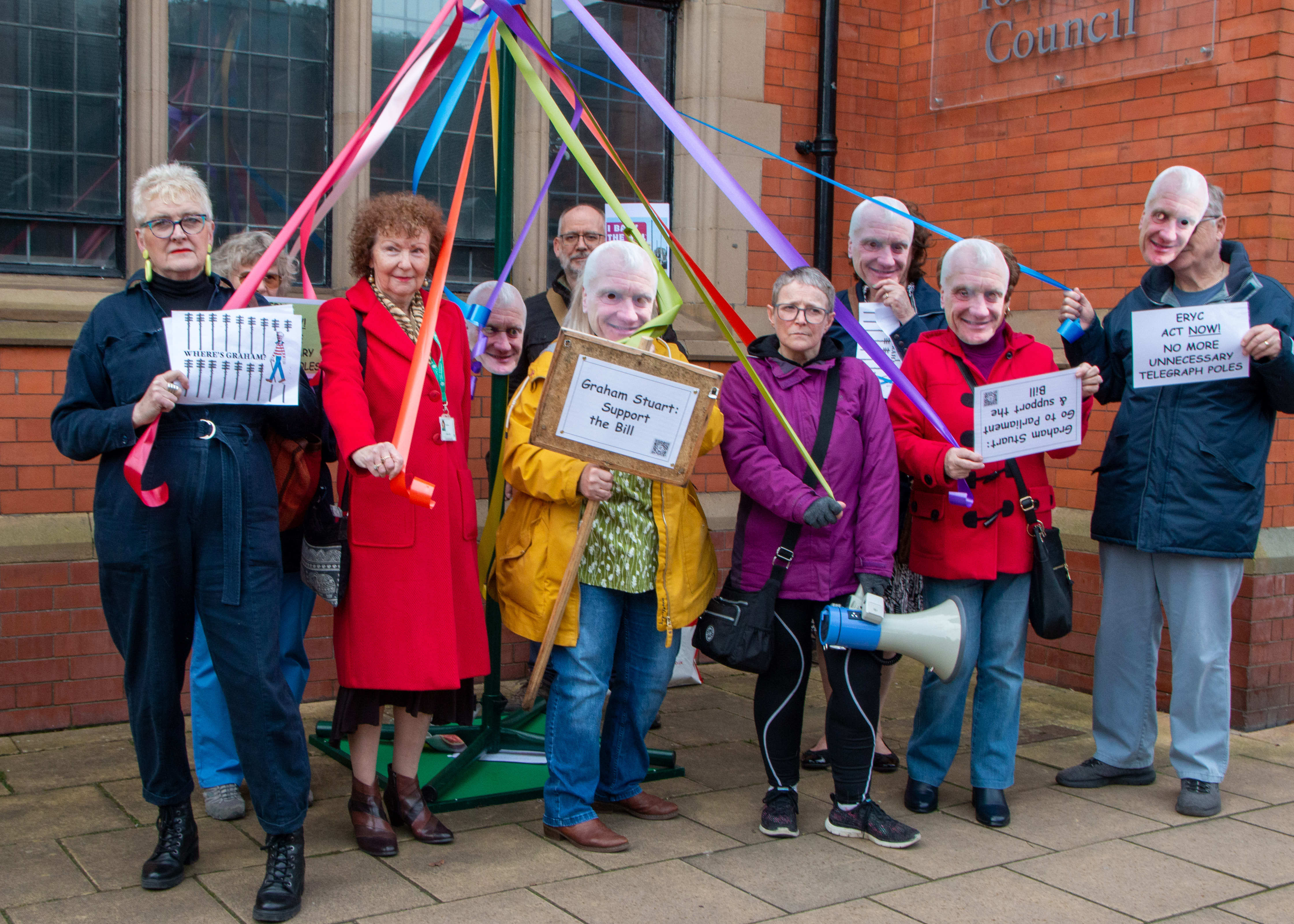 Merry go round May Pole protest