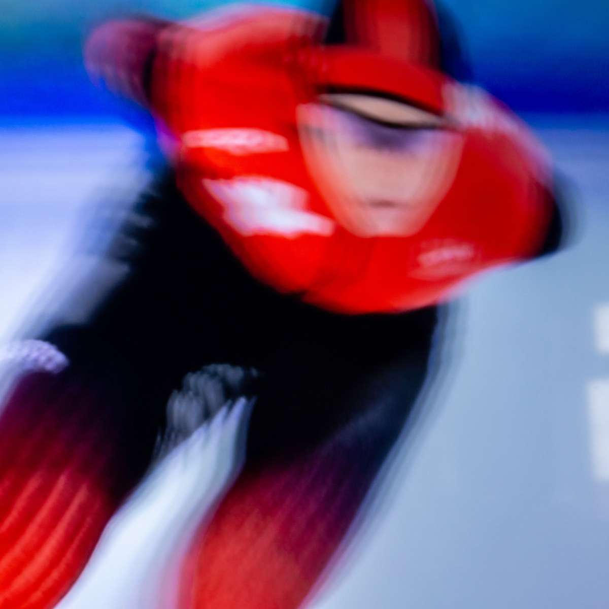 Image of a Speed Skater at the Olympics with a dramatic speedy blur effect